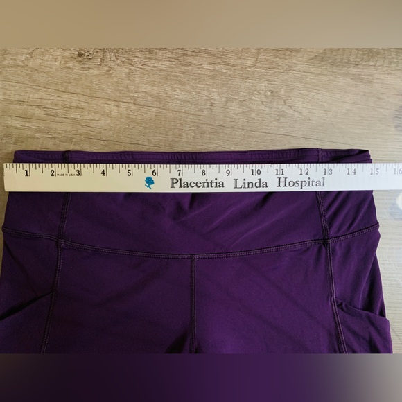 Size 10 lululemon mesh legging. Purple Mesh Crossover Back Stash Pocket Mid Rise - Picture 7 of 14